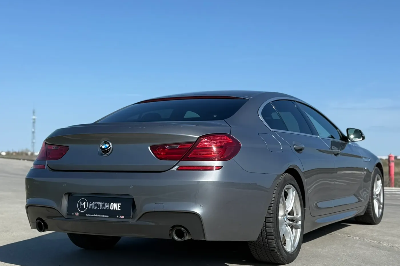 BMW Seria 6 Gran Coupé gri, spate trei sferturi